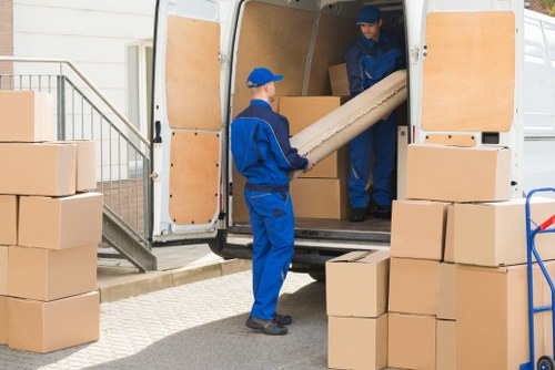 Removal team planning a home move in Vauxhall near apartment buildings