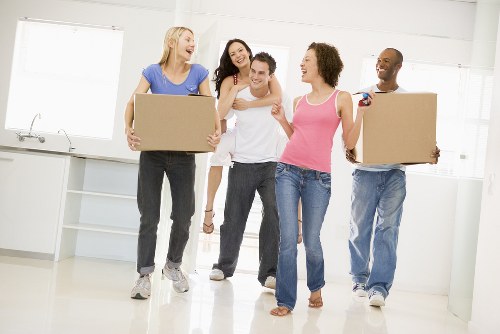 Loading furniture into a van for delivery in Vauxhall