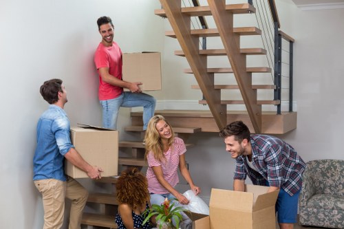 Removal team planning a move in Vauxhall with boxes and furniture