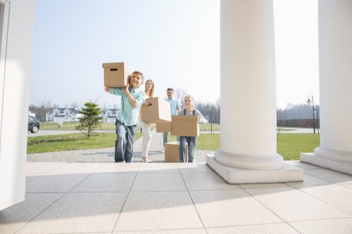 Loading furniture into a local removal van