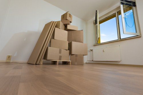 Removal van and moving boxes in Vauxhall residential street