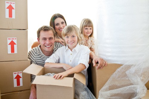 Packed moving boxes and furniture ready for transport