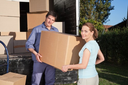 Packed boxes and furniture ready for transport in a Vauxhall property