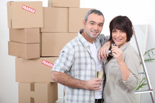 Commercial moving team arranging furniture and equipment for a Vauxhall business move